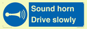 sound-horn-drive-slowly-warehousing-and-delivery-sign~